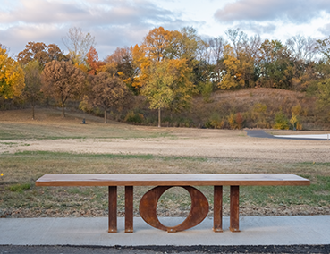 art bench in a Lakeville park