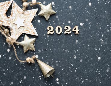 2024 with gold stars and bells